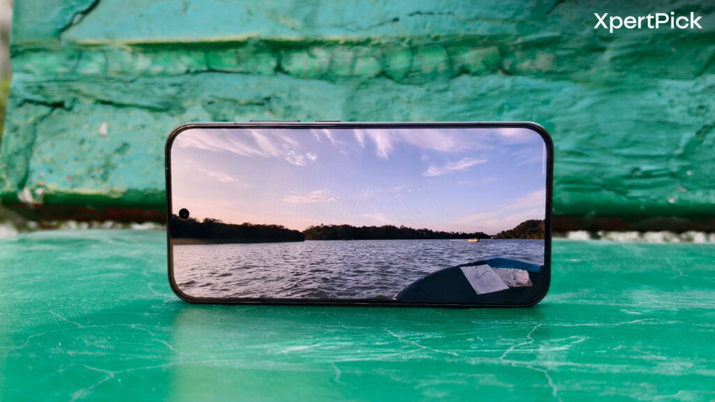 Oppo Reno15 Pro Mini display shown in landscape orientation while playing video content highlighting thin bezels and punch-hole front camera (Source: Yetnesh Dubey / XpertPick)